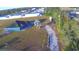 Home with large backyard and property line at 135 Mi Rancho Rd, Davenport, FL 33837