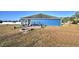 Large backyard with patio, fire pit, and plenty of space at 135 Mi Rancho Rd, Davenport, FL 33837