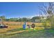 Large backyard with well and storage tanks at 135 Mi Rancho Rd, Davenport, FL 33837