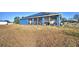 House with solar panels and spacious backyard at 135 Mi Rancho Rd, Davenport, FL 33837