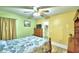 Bright bedroom with a double bed and walk-in closet at 135 Mi Rancho Rd, Davenport, FL 33837