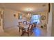 Formal dining room with chandelier and six chairs at 135 Mi Rancho Rd, Davenport, FL 33837
