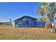 Ranch style home with palm tree at 135 Mi Rancho Rd, Davenport, FL 33837