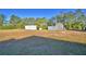 Property with detached barn and storage shed at 135 Mi Rancho Rd, Davenport, FL 33837