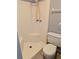 Bathroom with a corner shower, toilet, and shower attachments at 16 Kendra Ct # 16, Winter Haven, FL 33880