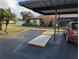 Covered carport provides convenient parking at 16 Kendra Ct # 16, Winter Haven, FL 33880