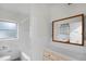 Clean bathroom, vanity, and bathtub at 1891 18Th Nw St, Winter Haven, FL 33881