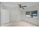 Spacious bedroom with ceiling fan and window at 1891 18Th Nw St, Winter Haven, FL 33881
