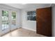 Bright bedroom with french doors leading to the backyard at 1891 18Th Nw St, Winter Haven, FL 33881