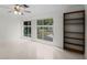 Spacious bedroom with large windows and built-in shelving at 1891 18Th Nw St, Winter Haven, FL 33881