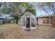 Image of a greenhouse in the backyard, ideal for gardening enthusiasts at 1891 18Th Nw St, Winter Haven, FL 33881