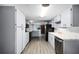 Renovated kitchen, featuring modern appliances and updated cabinetry at 1891 18Th Nw St, Winter Haven, FL 33881