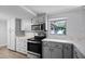 Updated kitchen with new countertops and stainless steel appliances at 1891 18Th Nw St, Winter Haven, FL 33881