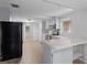 Modern kitchen with island and stainless steel appliances at 1891 18Th Nw St, Winter Haven, FL 33881