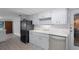 Eat-in kitchen with stainless steel appliances and ample cabinet space at 1891 18Th Nw St, Winter Haven, FL 33881