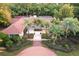 Luxury home with a circular driveway and meticulously landscaped grounds at 2300 N Scenic Hwy # 104, Lake Wales, FL 33898