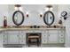 Double vanity bathroom with granite countertops and large mirrors at 2300 N Scenic Hwy # 104, Lake Wales, FL 33898