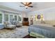 Main bedroom with bay window, sitting area, and hardwood floors at 2300 N Scenic Hwy # 104, Lake Wales, FL 33898