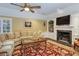 Spacious Gathering room features a cozy fireplace and large windows at 2300 N Scenic Hwy # 104, Lake Wales, FL 33898