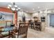 Open kitchen with granite island, custom cabinetry, and high end appliances at 2300 N Scenic Hwy # 104, Lake Wales, FL 33898
