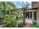 Relaxing patio with pergola, outdoor kitchen, and seating area at 2300 N Scenic Hwy # 104, Lake Wales, FL 33898