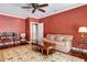 Sitting room with hardwood floors, comfortable seating, and a desk at 2300 N Scenic Hwy # 104, Lake Wales, FL 33898