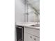 Wet bar with glass shelving, sink, and mini-refrigerator at 2300 N Scenic Hwy # 104, Lake Wales, FL 33898