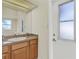 Small bathroom with vanity and exterior access at 231 Terranova Blvd, Winter Haven, FL 33884