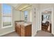 Bathroom with single vanity and view of bedroom at 231 Terranova Blvd, Winter Haven, FL 33884