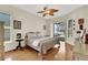 Bright bedroom with wood floors and access to a pool at 231 Terranova Blvd, Winter Haven, FL 33884