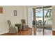 Breakfast nook with glass-top table and access to the pool area at 231 Terranova Blvd, Winter Haven, FL 33884