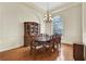 Elegant dining room featuring hardwood floors and a china cabinet at 231 Terranova Blvd, Winter Haven, FL 33884