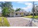 Cute ranch home with brick driveway and yard at 2918 Pineway Ave, Lakeland, FL 33803