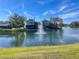 Stunning lake view of the community with a fountain at 3155 Stonewater Dr # 3155, Lakeland, FL 33803