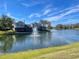 Waterfront property with a lake view and fountain at 3155 Stonewater Dr # 3155, Lakeland, FL 33803