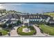 Elegant clubhouse with fountain and golf cart parking at 4101 Limerick Dr, Lake Wales, FL 33859