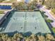 Two well-lit tennis courts available for residents at 4101 Limerick Dr, Lake Wales, FL 33859