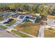 Aerial view showcasing home with pool and large grassy yard at 4210 Old Colony Rd, Mulberry, FL 33860
