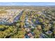 Wide aerial view showing property and surrounding homes at 4210 Old Colony Rd, Mulberry, FL 33860