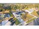 Aerial view showcasing the house, pool, and surrounding neighborhood at 4210 Old Colony Rd, Mulberry, FL 33860
