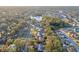 Aerial view of home near lake, showcasing neighborhood setting at 4210 Old Colony Rd, Mulberry, FL 33860