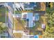 Directly above view of house featuring a pool and solar panels at 4210 Old Colony Rd, Mulberry, FL 33860