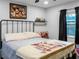 Bright bedroom with a comfortable bed and Disney themed decor at 4210 Old Colony Rd, Mulberry, FL 33860