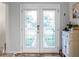 Elegant entryway with beautiful glass double doors at 4210 Old Colony Rd, Mulberry, FL 33860