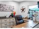 Bright home office with built-in drawers and a large desk at 4210 Old Colony Rd, Mulberry, FL 33860