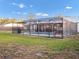 Inviting screened pool with a spacious deck for lounging at 4210 Old Colony Rd, Mulberry, FL 33860