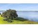 Scenic view of a large lake with lush green landscape at 603 Sweet Bay Cir # 603, Winter Haven, FL 33884