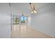 Living room with water view and access to patio at 603 Sweet Bay Cir # 603, Winter Haven, FL 33884