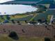 Property with home, vineyard, and lake view at 8243 Alturas Rd, Bartow, FL 33830