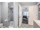 Bathroom with patterned tile shower and bedroom view at 8243 Alturas Rd, Bartow, FL 33830